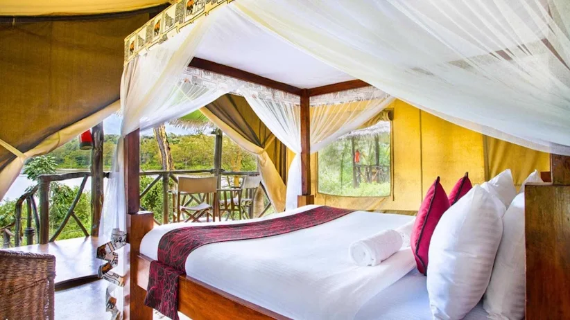 Rift Edge Tented Camp suite with canopy bed